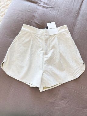 White metallic faux leather shorts
